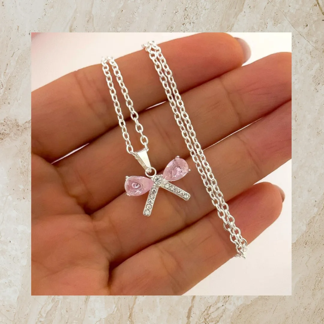 Collar acero blanco con moño rosa - Jimena Faggiana Concept